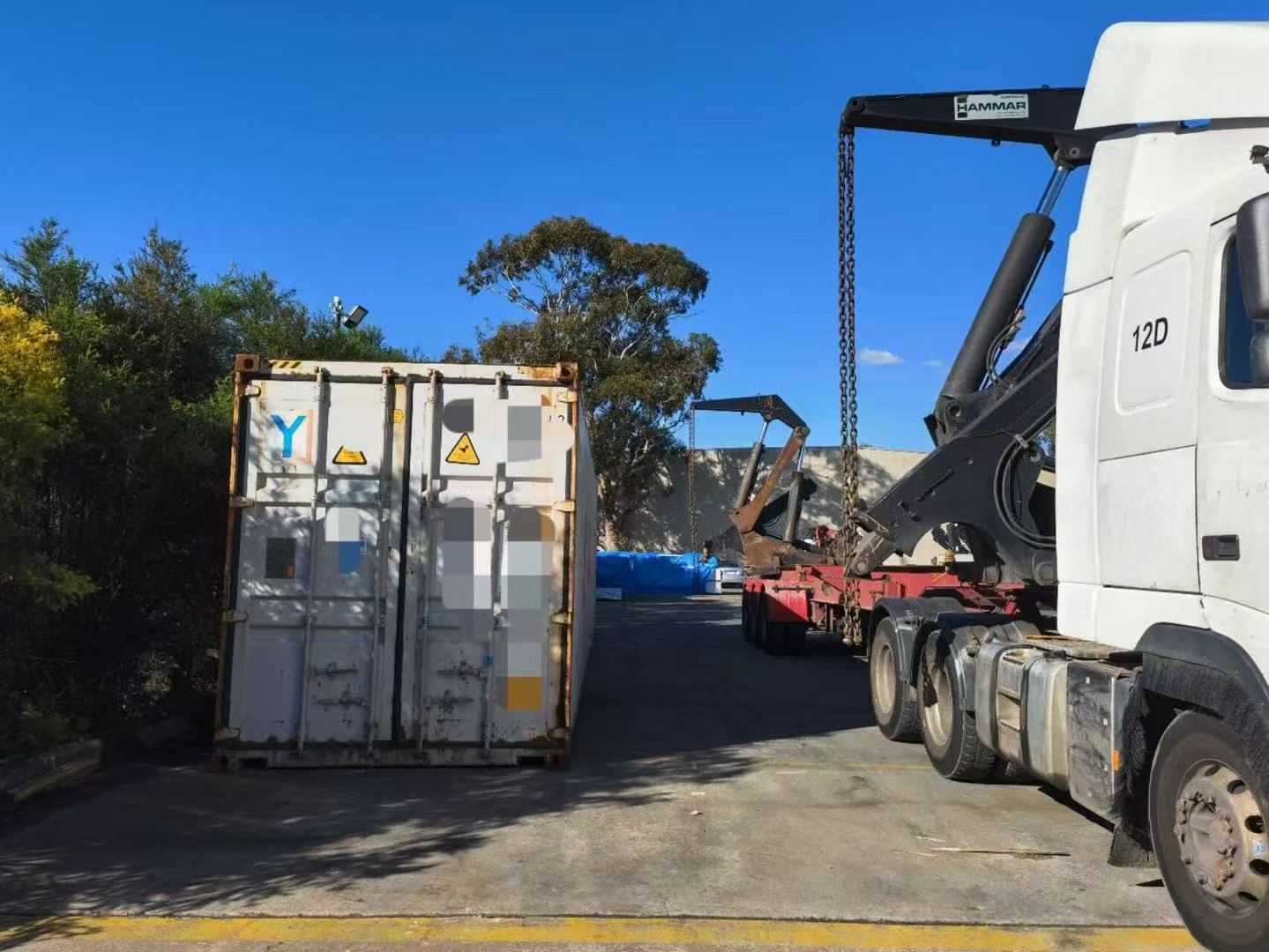 Container handling with a side-loader truck in Australia